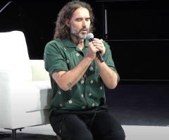 Russell Brand accompanied by man baptized with him at court hearing for sexual assault charges