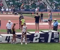High school girls refuse to share podium with male, turn backs in protest