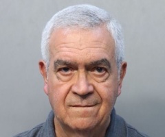 Priest facing battery charge after scuffle with woman at donations table