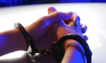 Woman charged with burying 'developed male infant' after taking abortion pill, police say