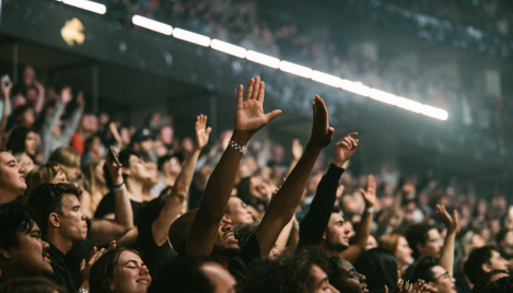 John Piper on whether raising hands in worship is 'showing off'