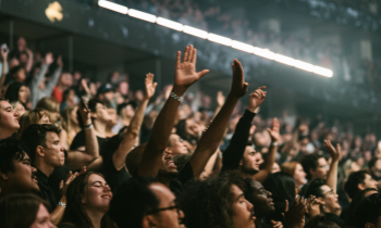 John Piper on whether raising hands in worship is 'showing off'