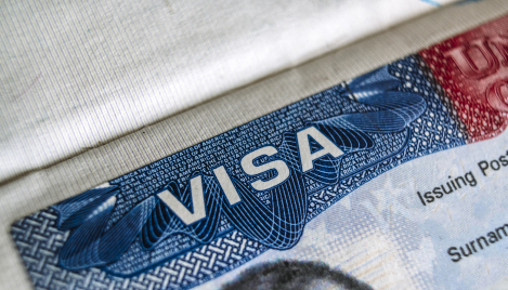 3 things to know about Trump's new immigration visa freeze