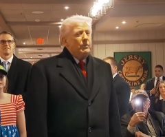Trump prays with supporter during campaign stop in Iowa
