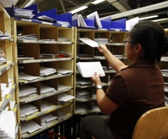 US Postal Service Reducing Workforce, Slashing Benefits