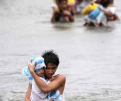 Typhoon Nesat Causes Widespread Flooding in Philippines; Thousands Flee