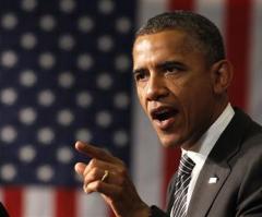 Obama Blasts Romney on Immigration Reform